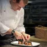 Sonny Sweetman plating food.  